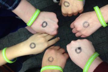 Mental health day stamps on hands