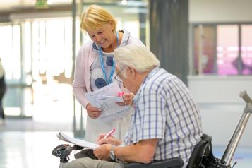 Man completing healthwatch survey