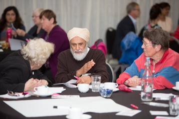 People talking around table