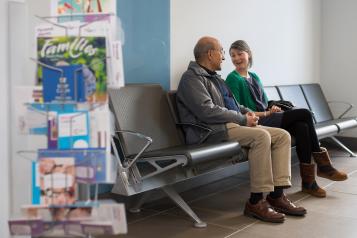 2 people talking in hospital