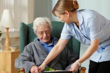 Nurse with elderly patient