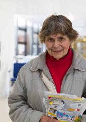 Woman holding information